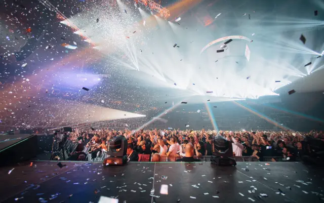 concert event lighting setup showing beam wash profile lights stage rigging and live performance lighting system