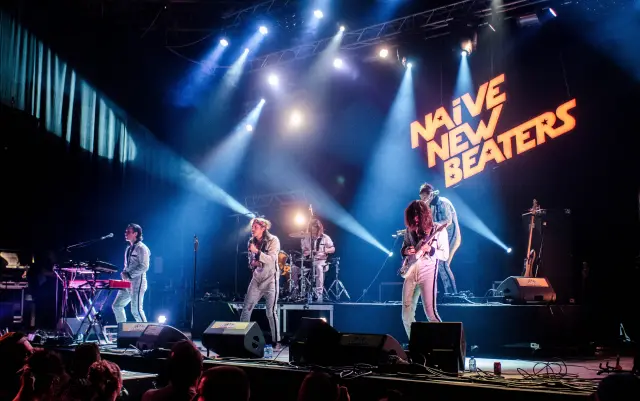 concert laser lighting systems for live stage productions showing laser projectors concert stage effects haze atmosphere and live event lighting integration