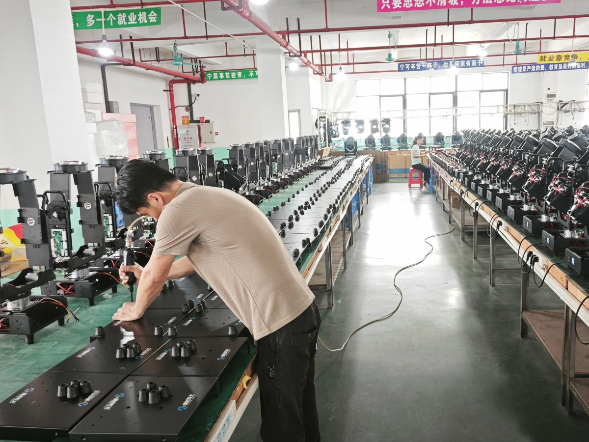 Concert stage lighting fixtures undergoing factory testing before wholesale shipment