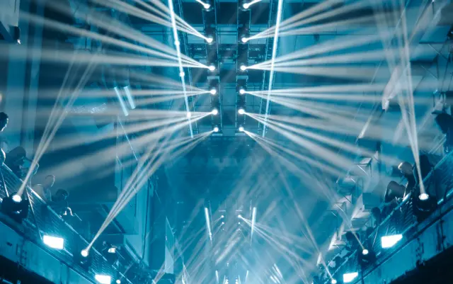 corporate event lighting system for conferences showing wash lighting front lighting control system and balanced illumination setup